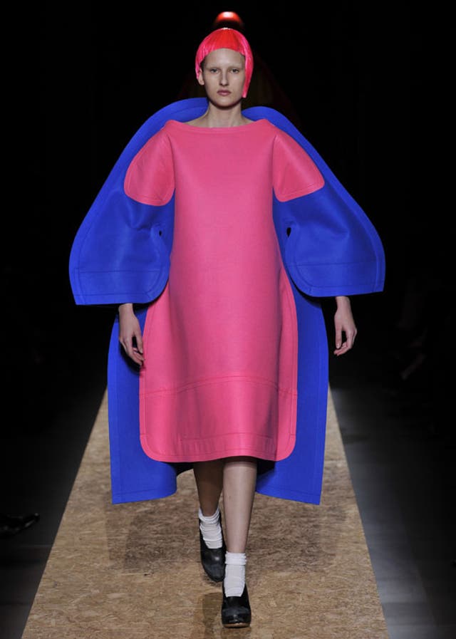 Comme des Garçons showed 'two dimensional' (flattened) and enormous clothes in uncompromising colours - blithe blues, pinks, reds, yellows