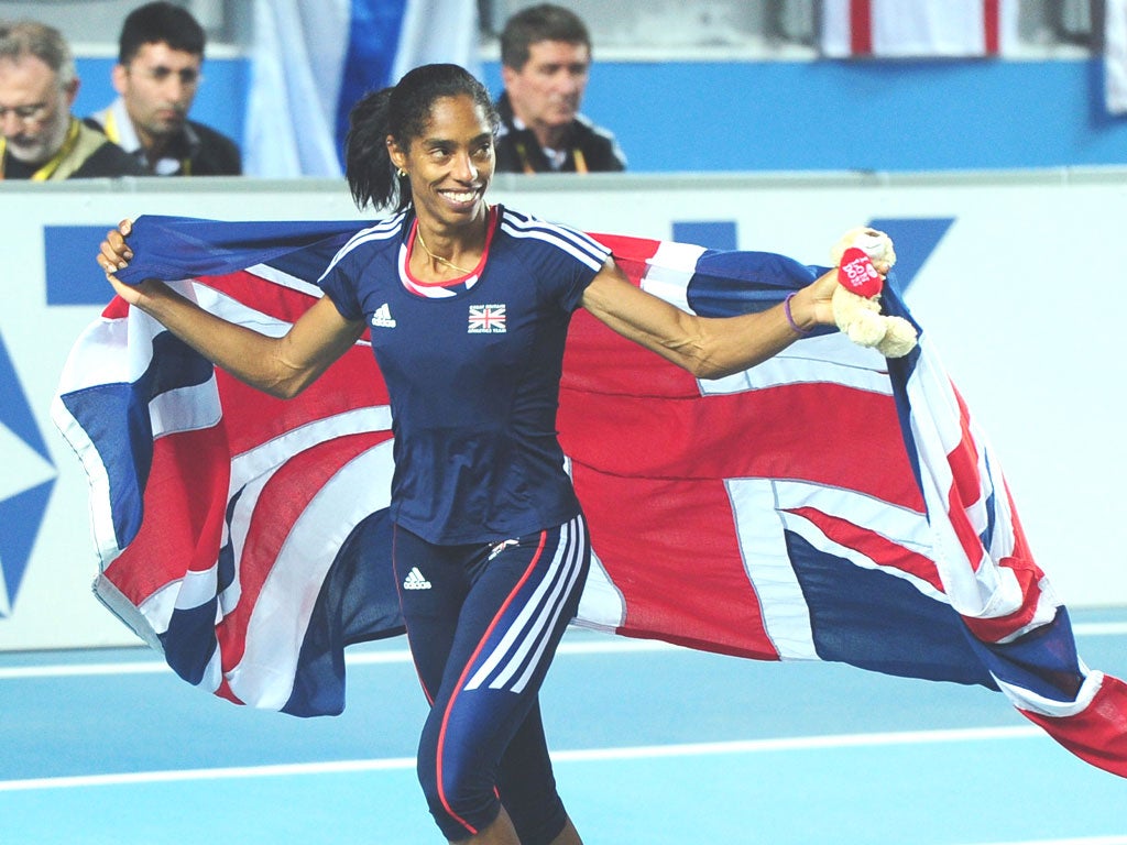 Yamile Aldama celebrates with the Union Jack after her gold medal