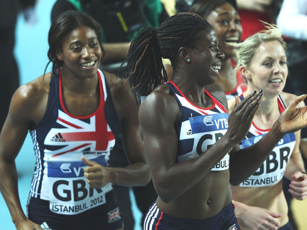 Christine Ohuruogu leads Shana Cox, Perri Shakes-
Drayton and Nicola Sanders in celebration after their
4x400m gold