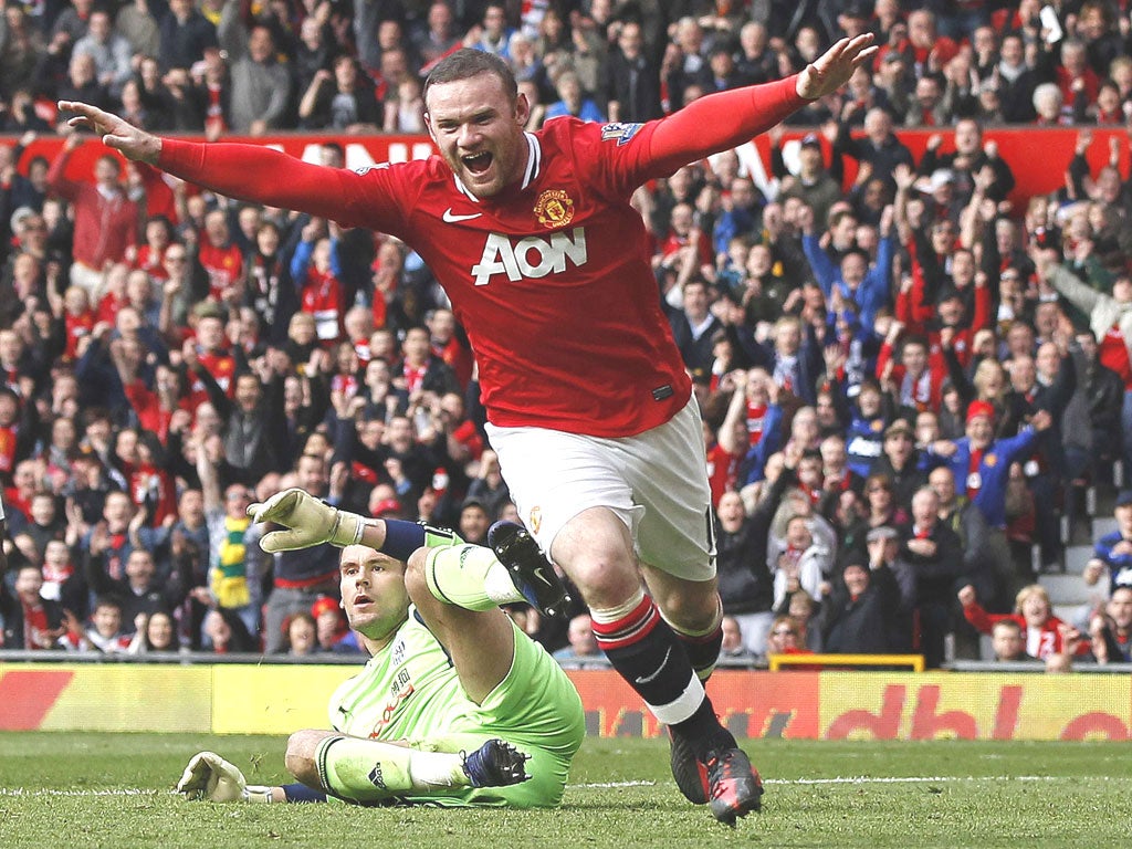 Wayne Rooney celebrates giving United the lead