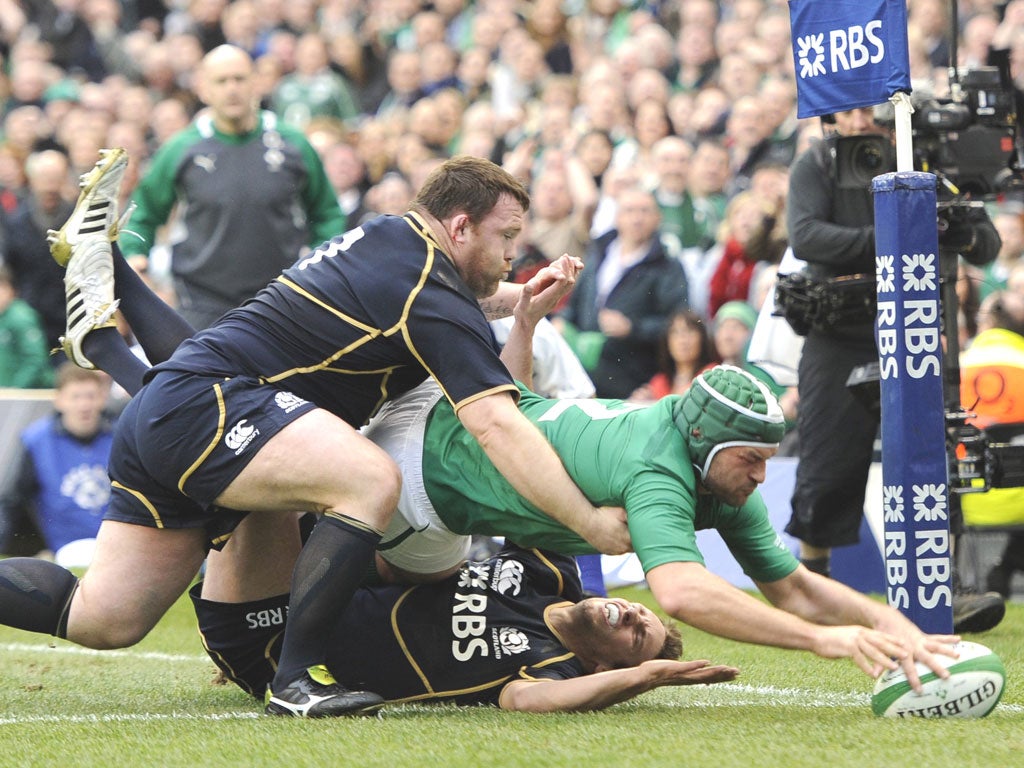 Rory Best, Ireland’s captain in the absence of Brian
O’Driscoll, goes over for his side’s first try in Dublin on
Saturday