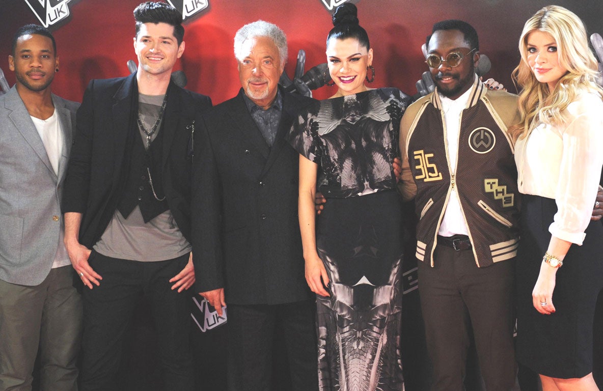 The cast of The Voice (l-r): Reggie Yates, Danny O’Donoghue, Tom Jones, Jessie J , Will.i.am and Holly Willoughby will go head-to-head with Simon Cowell’s Britain’s Got Talent on ITV