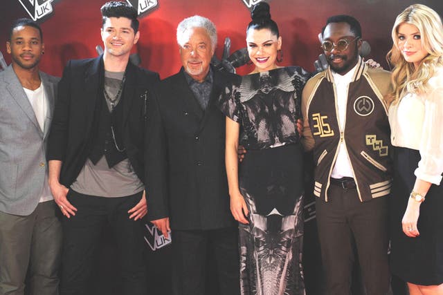 The cast of The Voice (l-r): Reggie Yates, Danny O’Donoghue, Tom Jones, Jessie J , Will.i.am and Holly Willoughby will go head-to-head with Simon Cowell’s Britain’s Got Talent on ITV