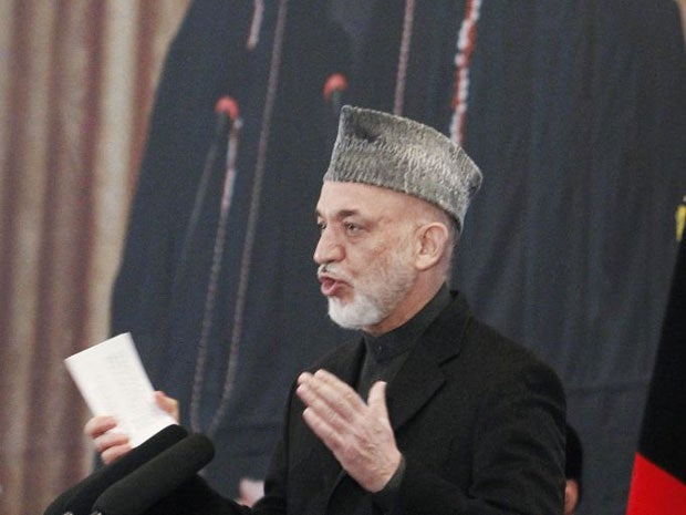 Hamid Karzai has called on the West to withdraw from villages as the Taliban sever talks on Afghanistan's future