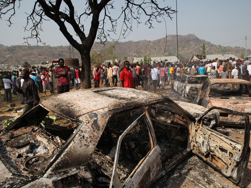 The scene outside St Theresa Catholic Church after a bomb blast in the Madala Zuba district of Nigeria's capital Abuja on Christmas Day, 2011.