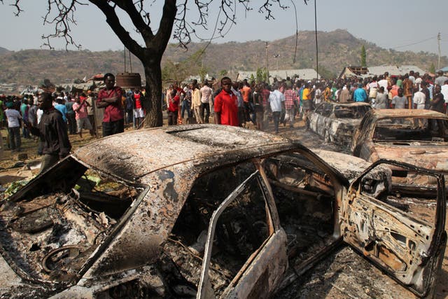 The scene outside St Theresa Catholic Church after a bomb blast in the Madala Zuba district of Nigeria's capital Abuja on Christmas Day, 2011.