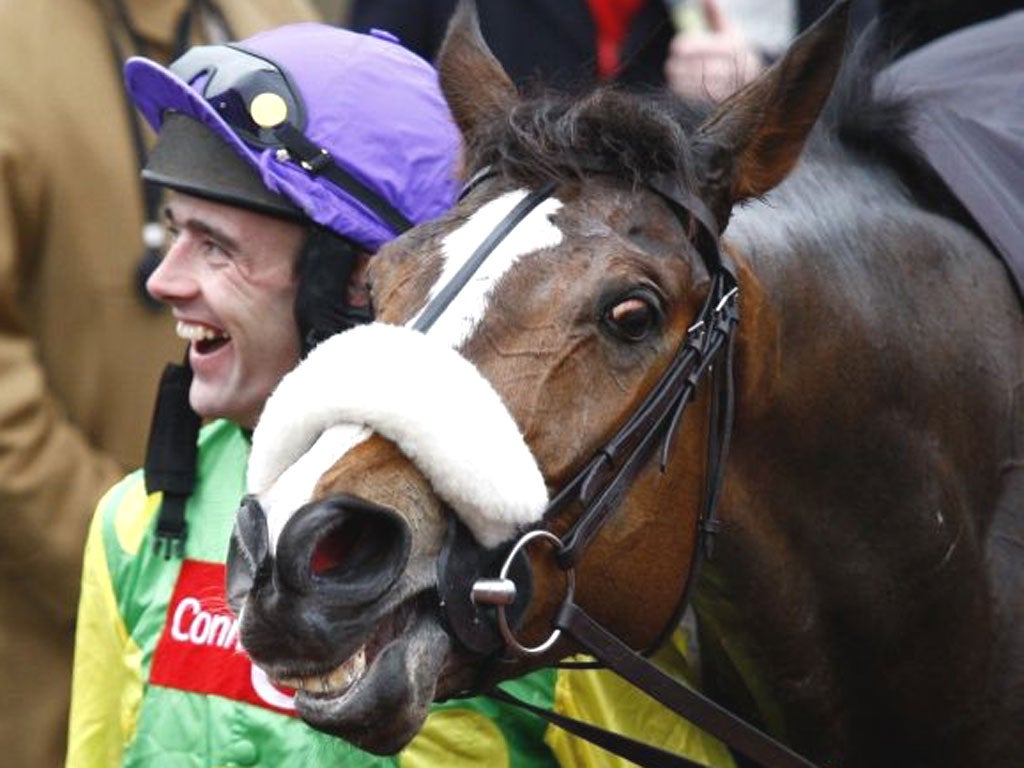 Ruby Walsh celebrates winning the 2009 Gold Cup on Kauto Star