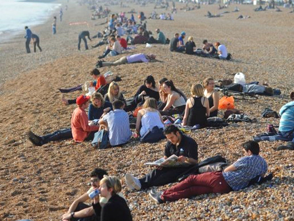 Britons were out in force yesterday at places such as Brighton beach to enjoy warm weather conditions that matched those in Tunisia