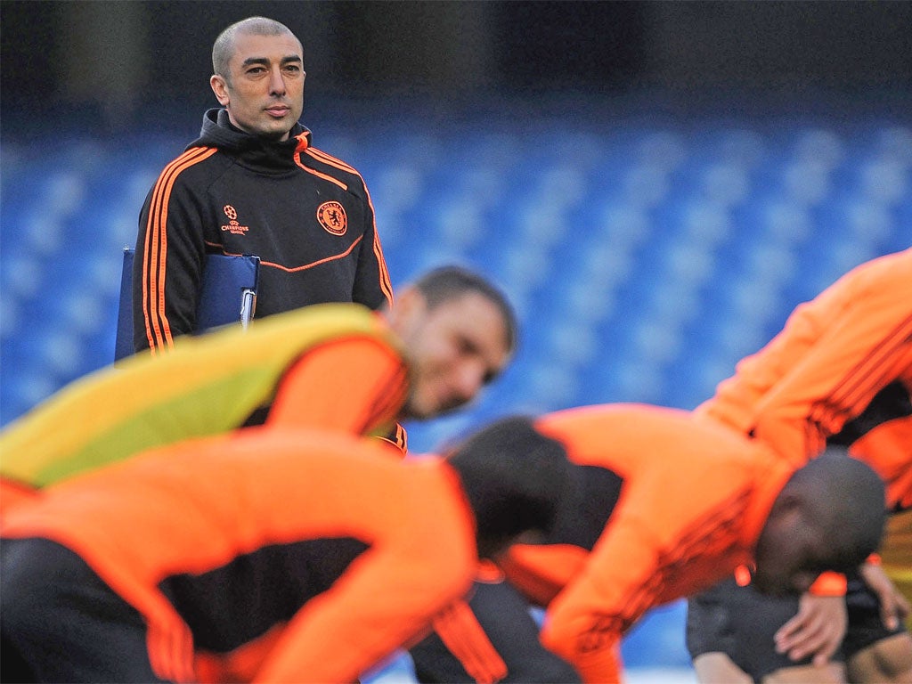 Chelsea's caretaker manager Roberto Di Matteo supervises training at Stamford Bridge yesterday