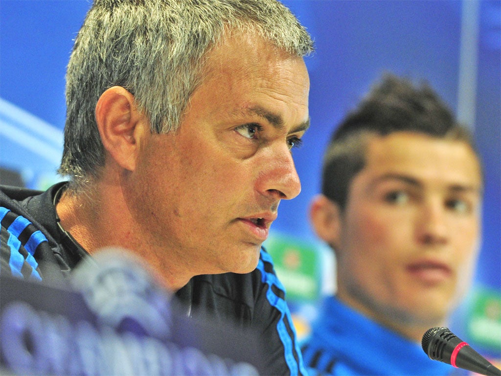 Jose Mourinho and Cristiano Ronaldo attend a press conference in Madrid yesterday