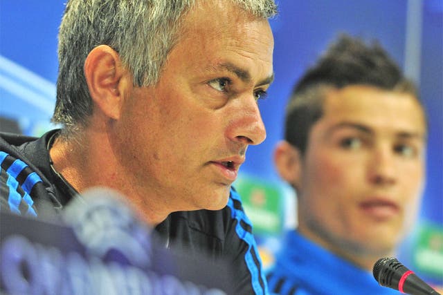 Jose Mourinho and Cristiano Ronaldo attend a press conference in Madrid yesterday