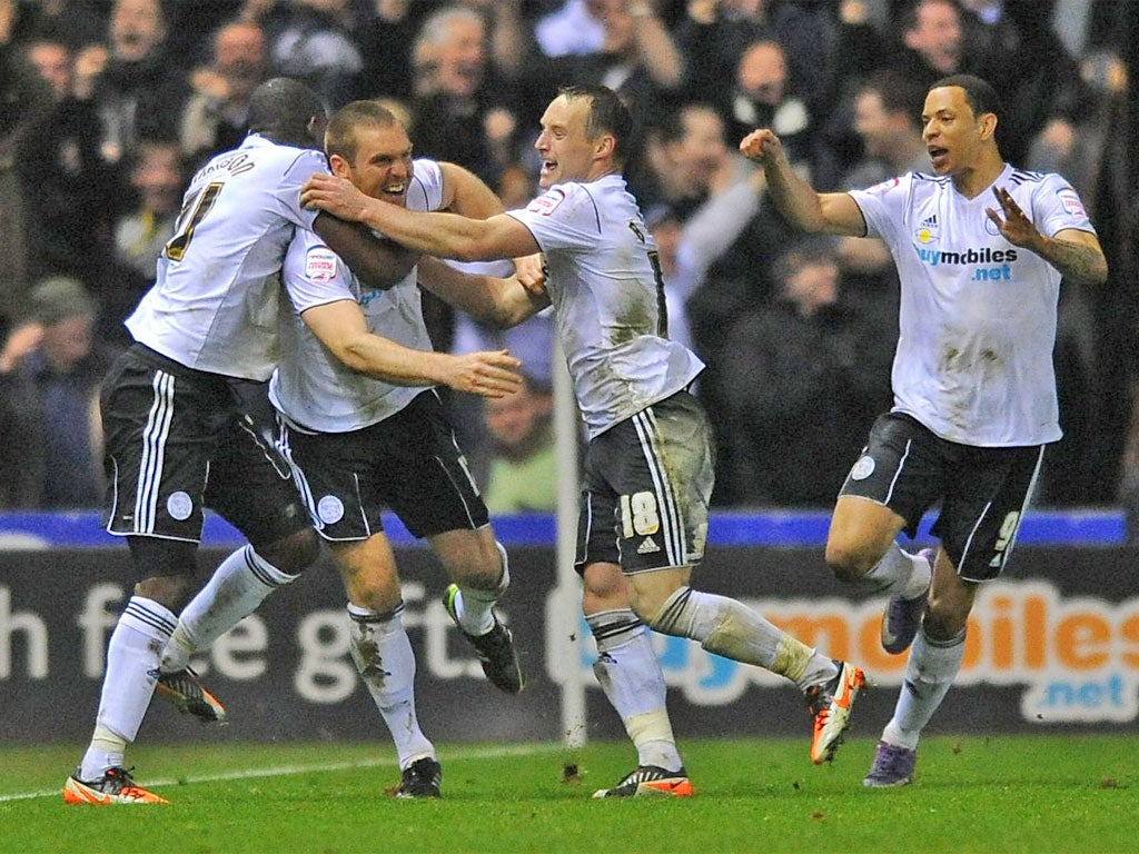 Derby's Jake Buxton (second left) celebrates his late winner last night