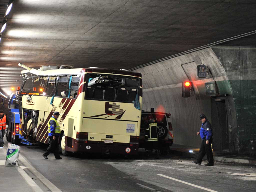 A bus carrying Belgian students returning from a skiing holiday crashed into a wall in a Swiss tunnel
