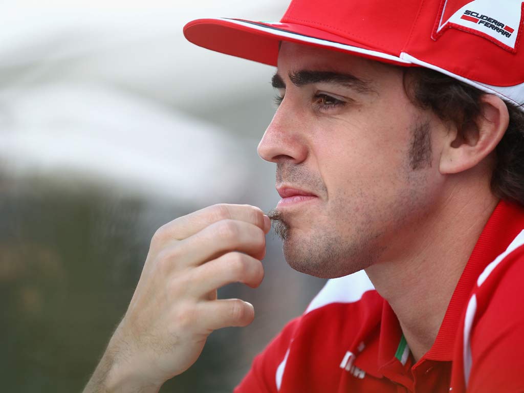 Fernando Alonso is predicting a slow start for Ferrari