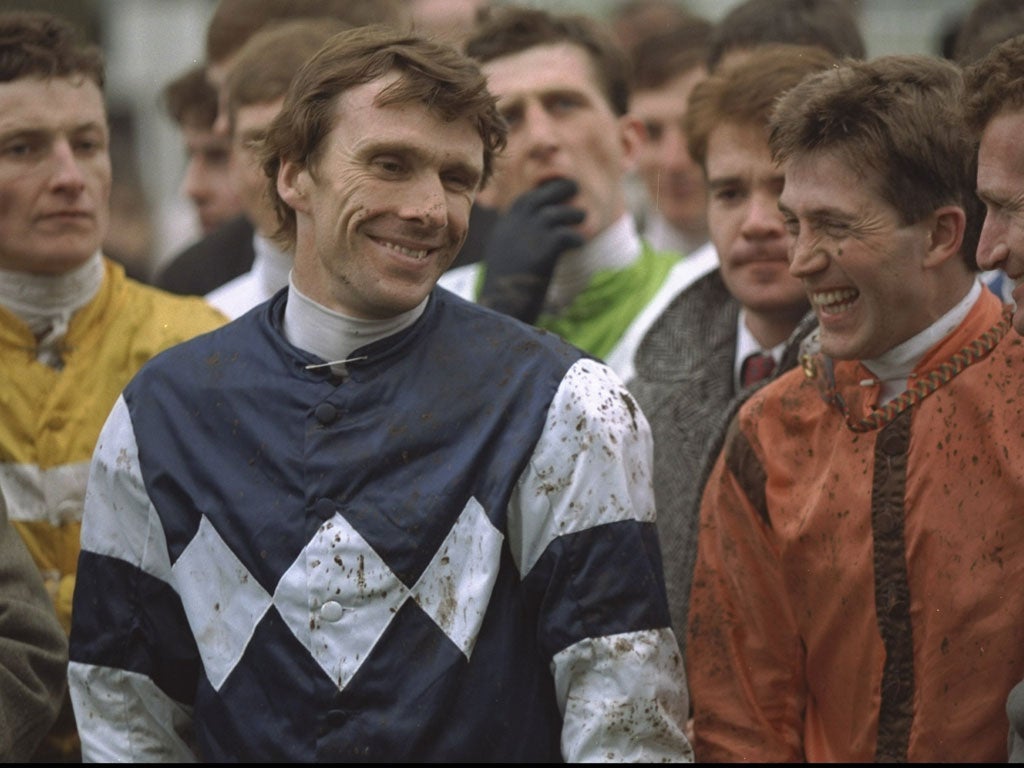 Peter Scudamore of Great Britain smiles with fellow jockeys after winning his last race on Sweet Duke before his retirement from racing