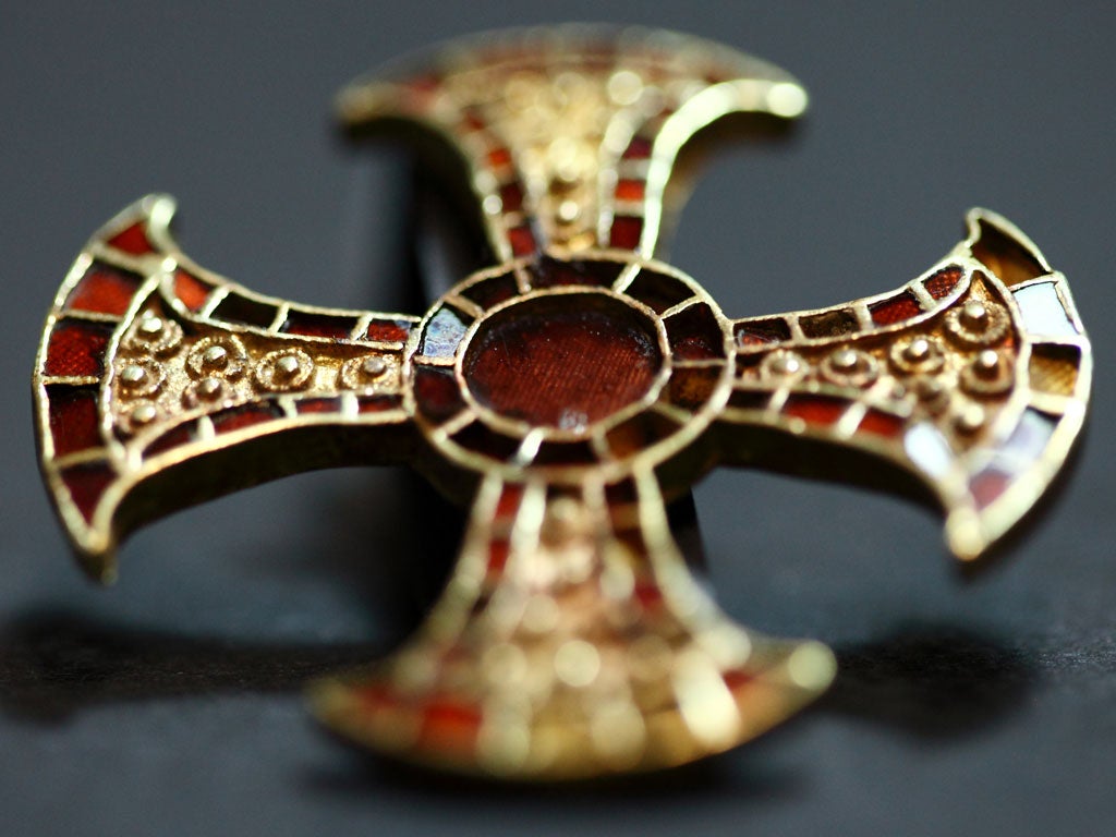 The gold cross following restoration