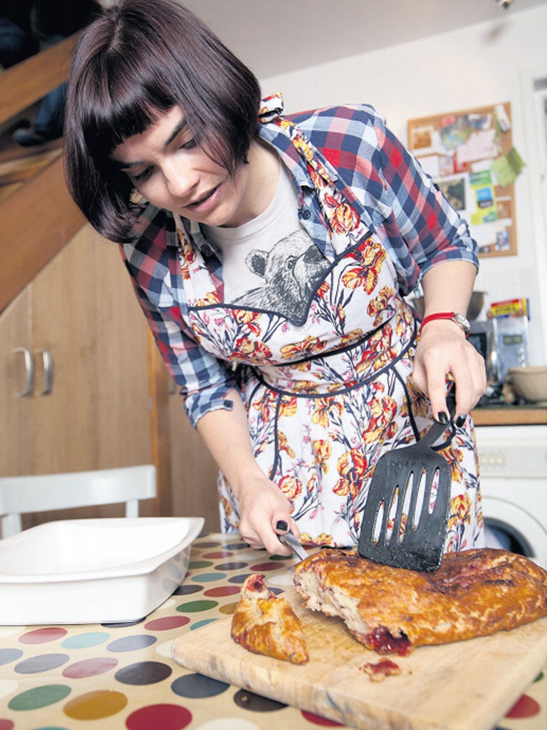 Alice Marshall prepares jam roly-poly