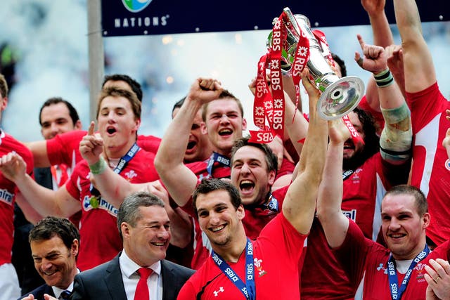 Wales captain Sam Warburton lifts the RBS 6 Nations trophy