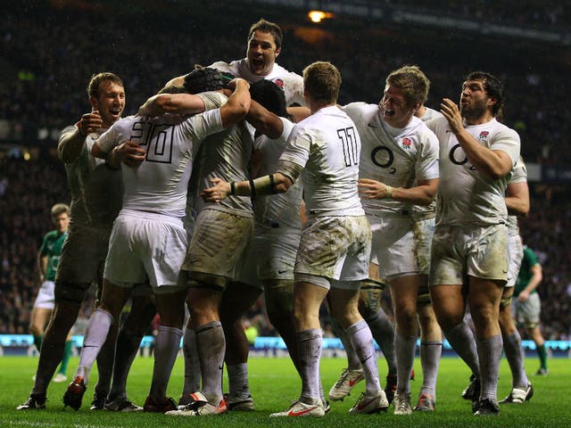 England players celebrate at the final whistle