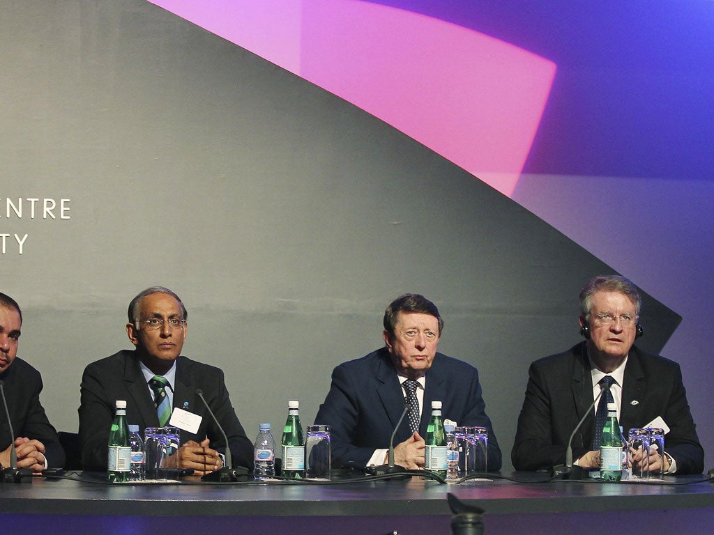 On the panel: Sir Dave Richards, who was billed as the chairman of the 'Football Association Premier League', is flanked by Haroon Lorgat (left), the South African head of cricket, and Bernard Lapasset, the French head of international rugby. Richards ups