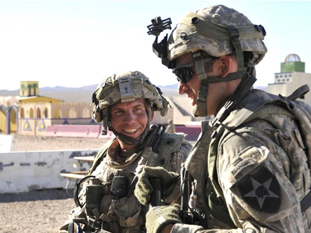 Staff Sergeant Robert Bales, left, at a US training centre last year