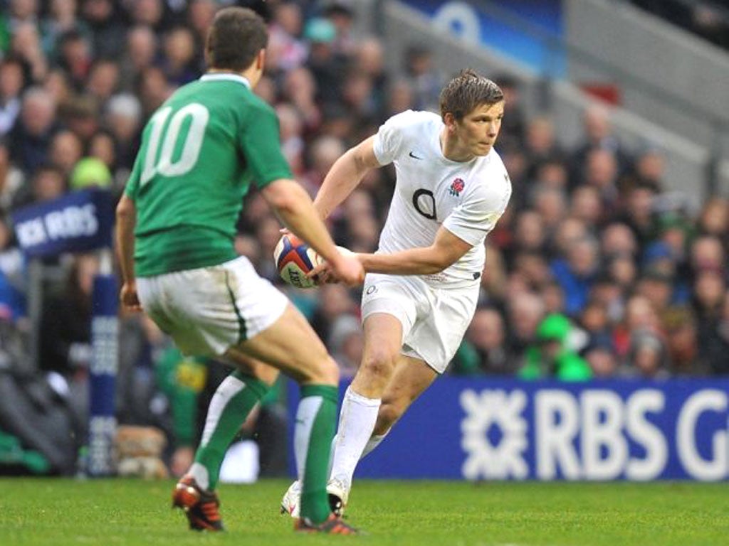Owen Farrell prepares to pass the ball during the win over Ireland