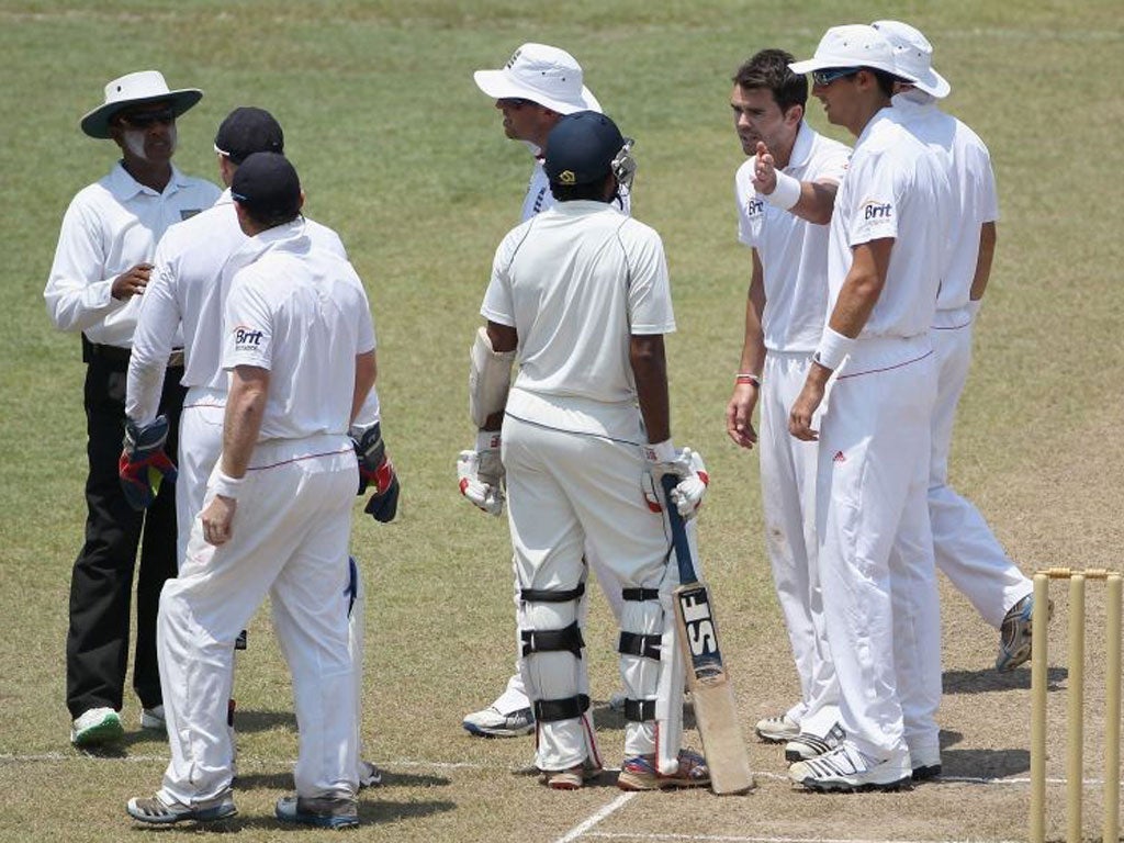 England players argue with the umpire while James Anderson berates Dilruwan Perera for his failure to walk