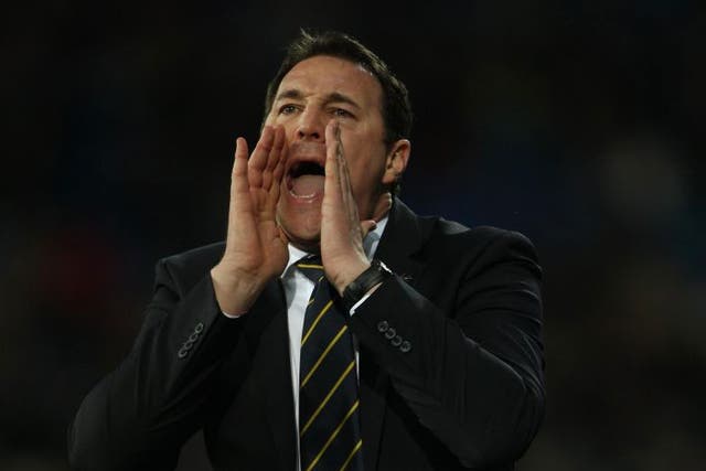 MALKY MACKAY: The Cardiff manager says
they are still in 'touching distance of the play-offs'