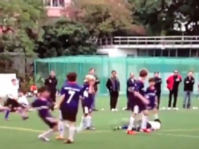 An under-12s football game in Hong Kong goes violent