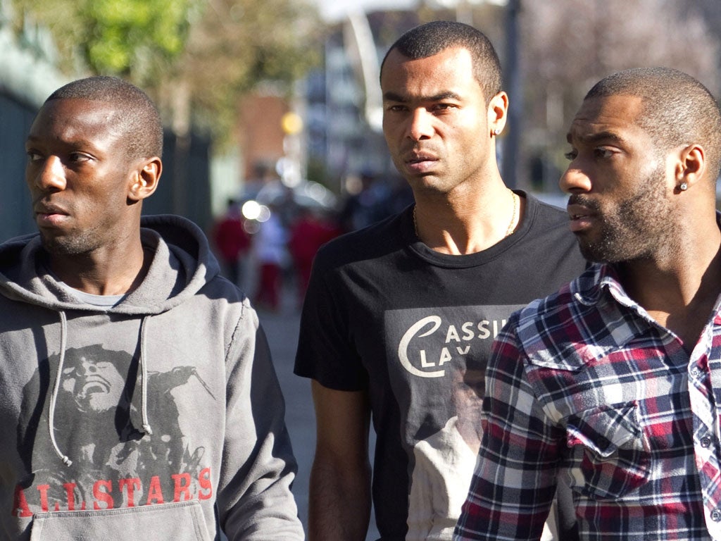 Chelsea’s Ashley Cole (centre) and Shaun Wright-Phillips (left) of Queen’s Park Rangers arrive at the London Chest Hospital yesterday