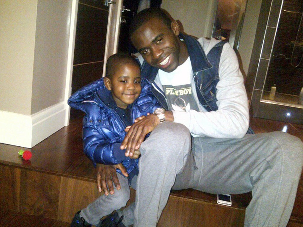 Muamba with his son Joshua