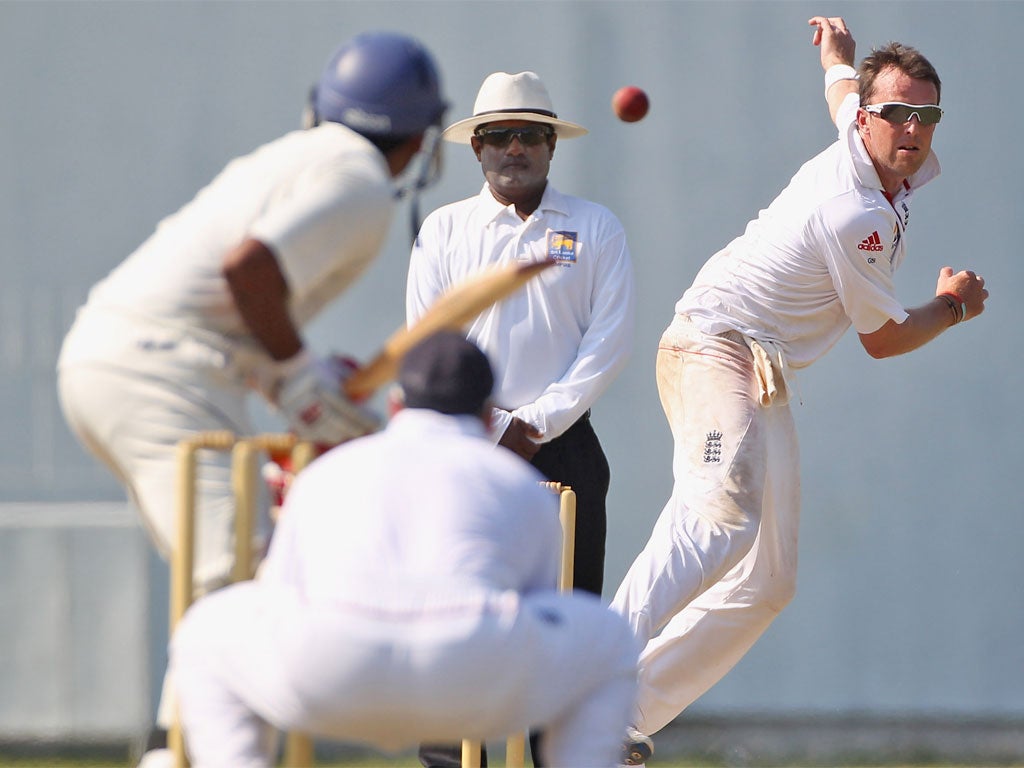 Graeme Swann turns his arm over during day one of the tour match between Sri Lanka A and England