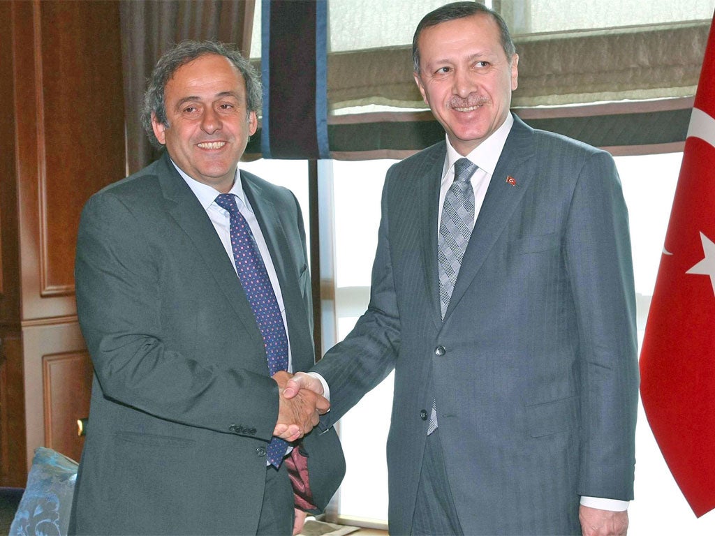 Turkish PM Tayyip Erdogan (right) with Uefa's Michel Platini