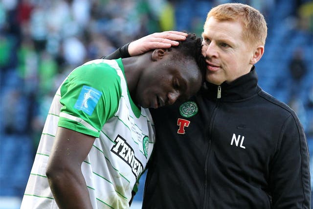 Victor Wanyama is comforted by Neil Lennon after losing the Scottish League Cup final