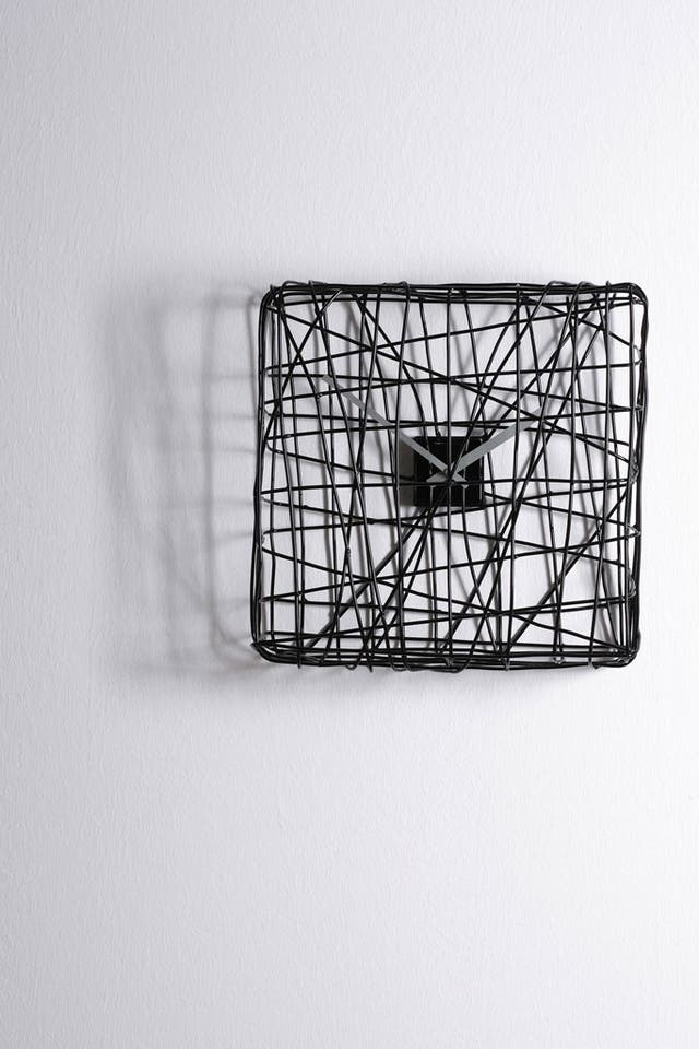1. Ti Aspetto Dietro L'angolo wall clock 

<p>Milk Concept Boutique, £185. Seize the moment with this minimalist "cage". mydeco.com</p>