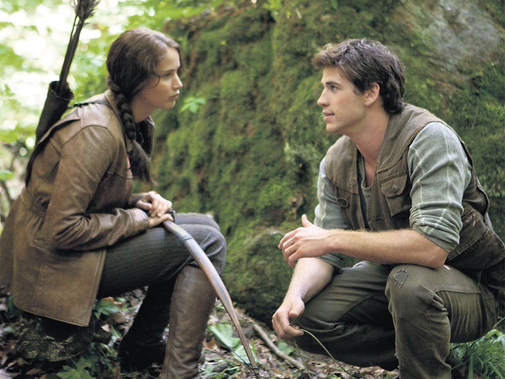 Jennifer Lawrence and Liam Hemsworth in The Hunger Games