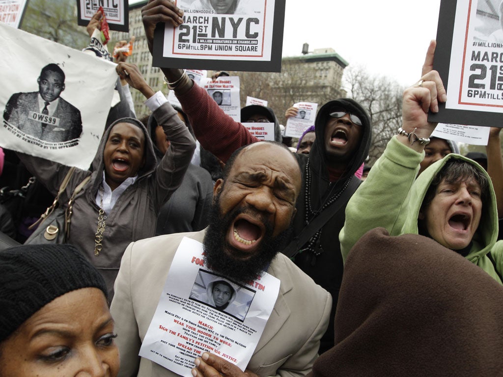 Demonstrators in New York protest about shot teenager Trayvon Martin, who was killed by a neighbourhood watch captain