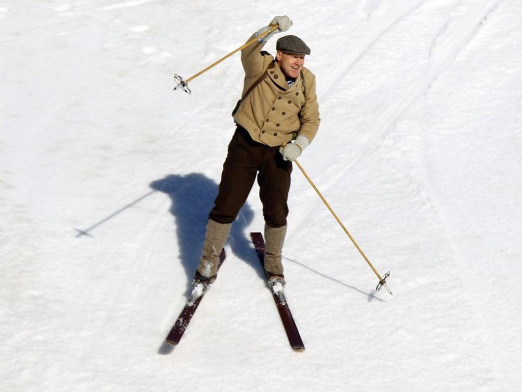 Didier Cuche waves farewell to a great skiing career in good cheer and vintage clobber
