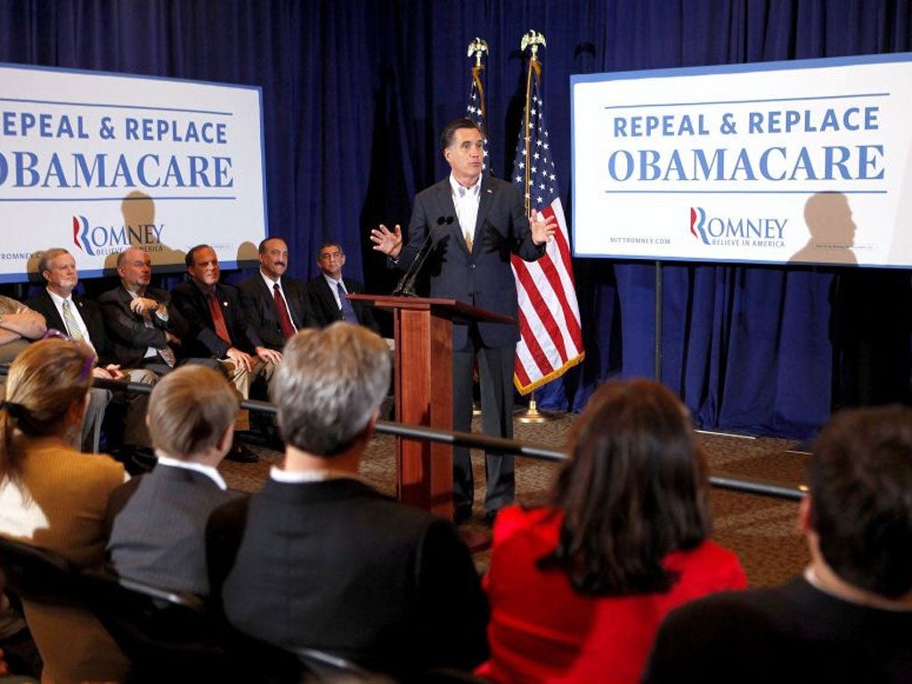 Mitt Romney talks to Republican voters in Metairie, Louisiana, yesterday