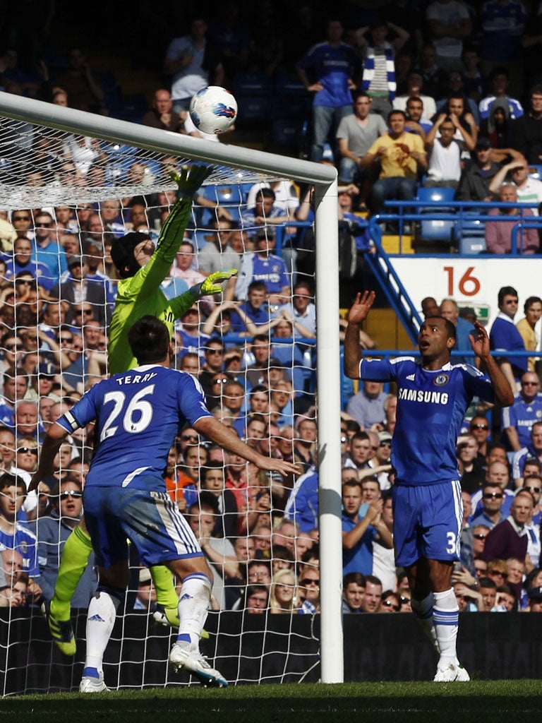 Over and out: Chelsea's Petr Cech sees a Spurs effort clear the bar