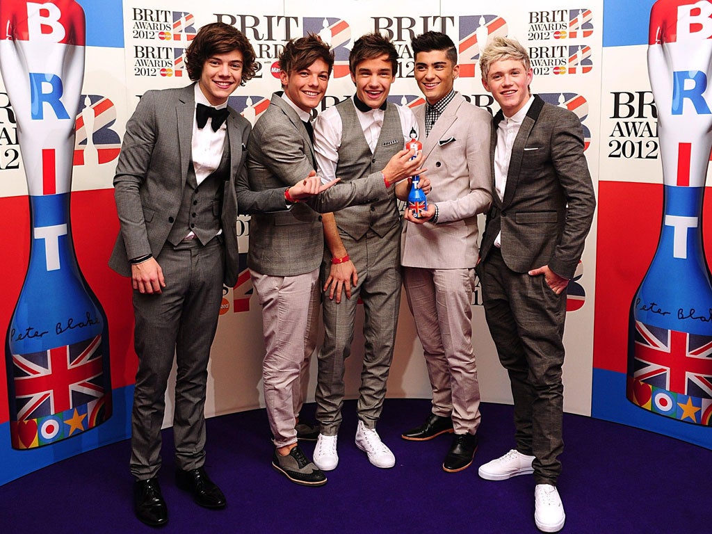 The Only Way Is Up: One Direction with their Brit Award for best single. We cringe now, but their sound will sum up an era one day