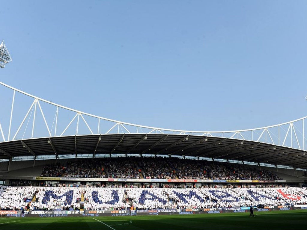 The Reebok crowd pay tribute to Fabrice Muamba;