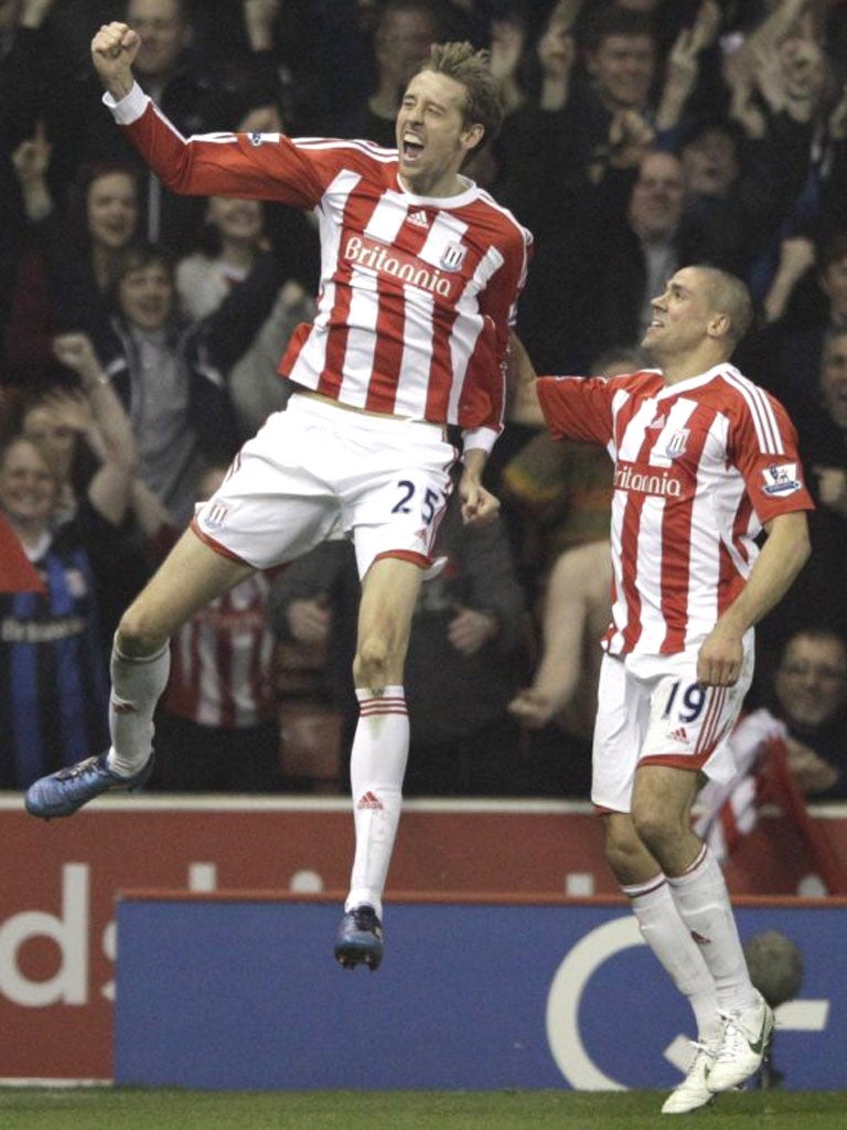 Peter Crouch enjoys his wonder strike against Manchester City