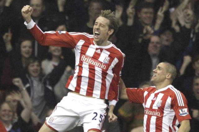 Peter Crouch enjoys his wonder strike against Manchester City