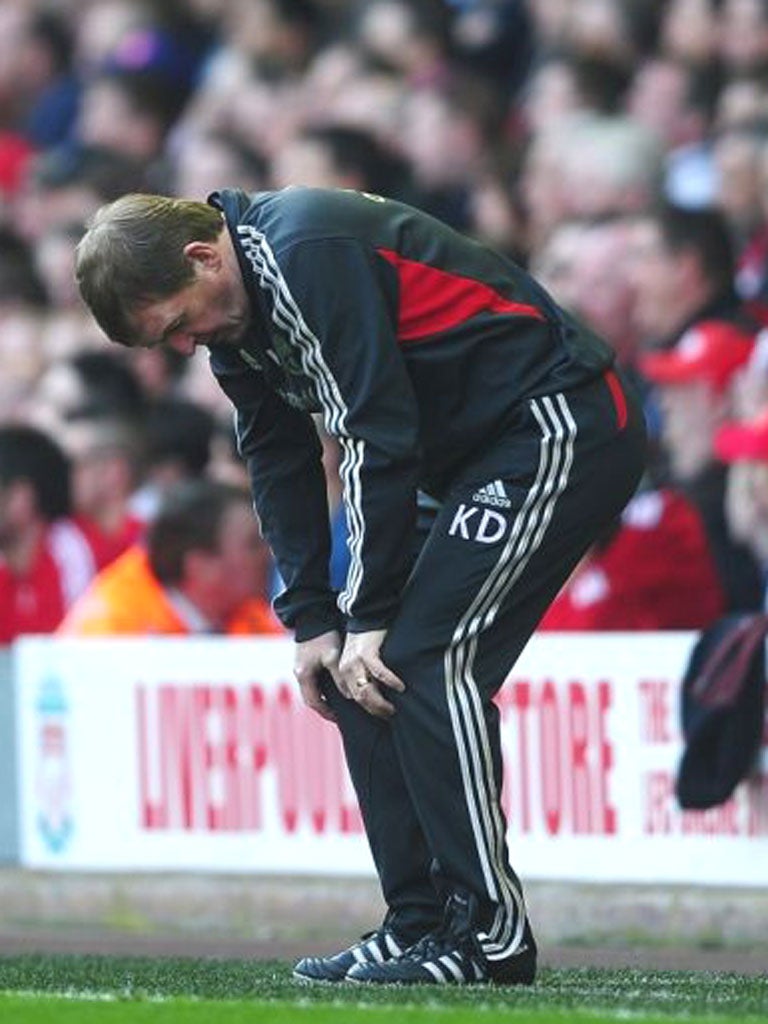 A forlorn Kenny Dalglish during the home defeat to Wigan