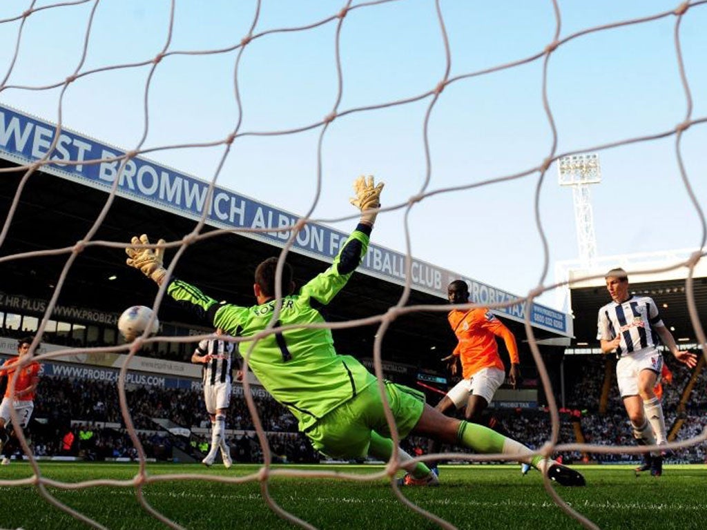 Newcastle’s Papiss Cissé scores the opener at The Hawthorns