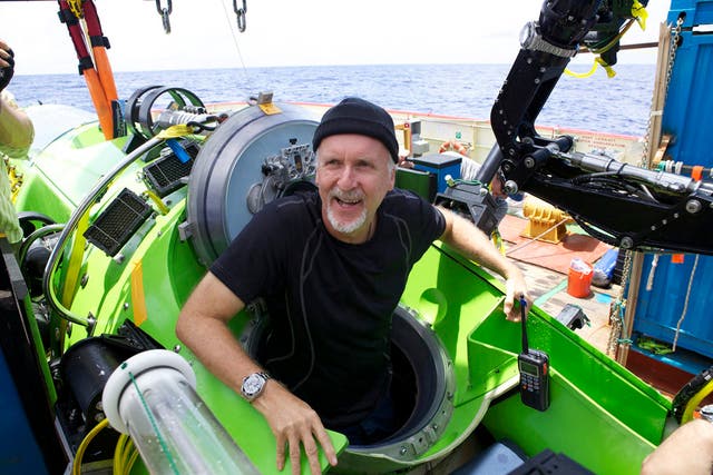 <p>James Cameron emerges from the Deepsea Challenger in 2012 after making the first solo trip to the world’s deepest point </p>
