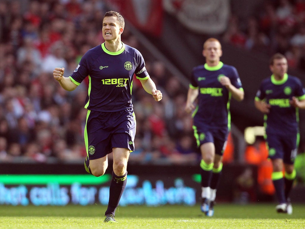 Liverpool 1-2 Wigan Gary Caldwell celebrates scoring what proved to be the decisive goal as Wigan grabbed their first-ever win at Anfield at a vital three points in their struggle to stay in the Premier League.