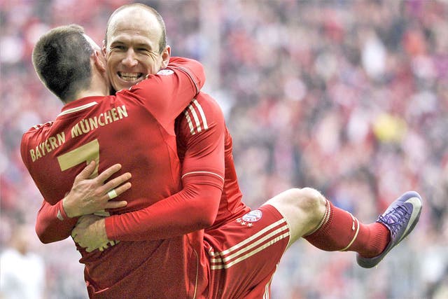 Arjen Robben holds Franck Ribéry as the two wingers celebrate one of many goals during Bayern's recent hot streak