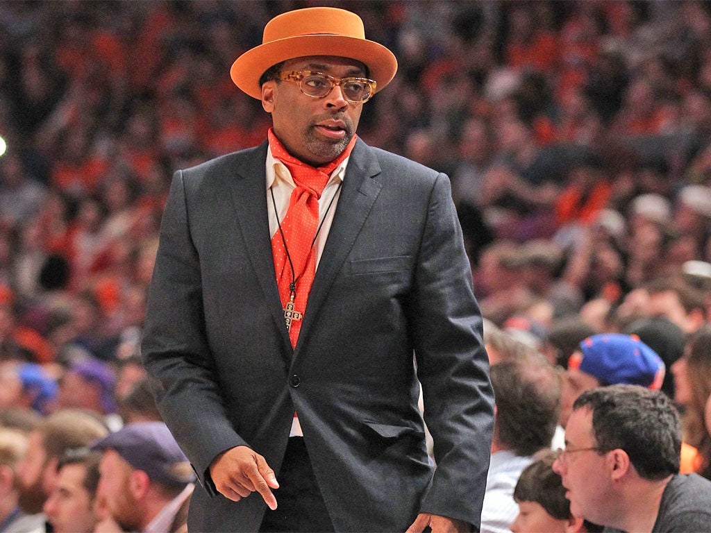 Film director Spike Lee, pictured cheering on his beloved New York Knicks